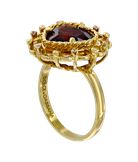 Кольцо Dolce & Gabbana из жёлтого золота 750 пробы с сапфирами и гранатом