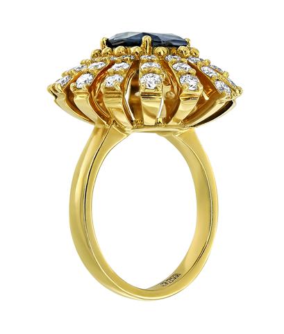Кольцо из желтого золота 750 пробы с сапфиром и бриллиантами